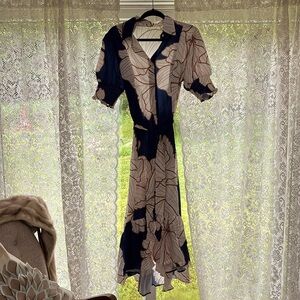 This one stunning. NEVER WORN Size 12